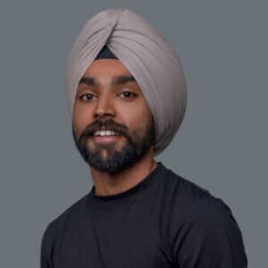 pleased man in the turban looking ahead